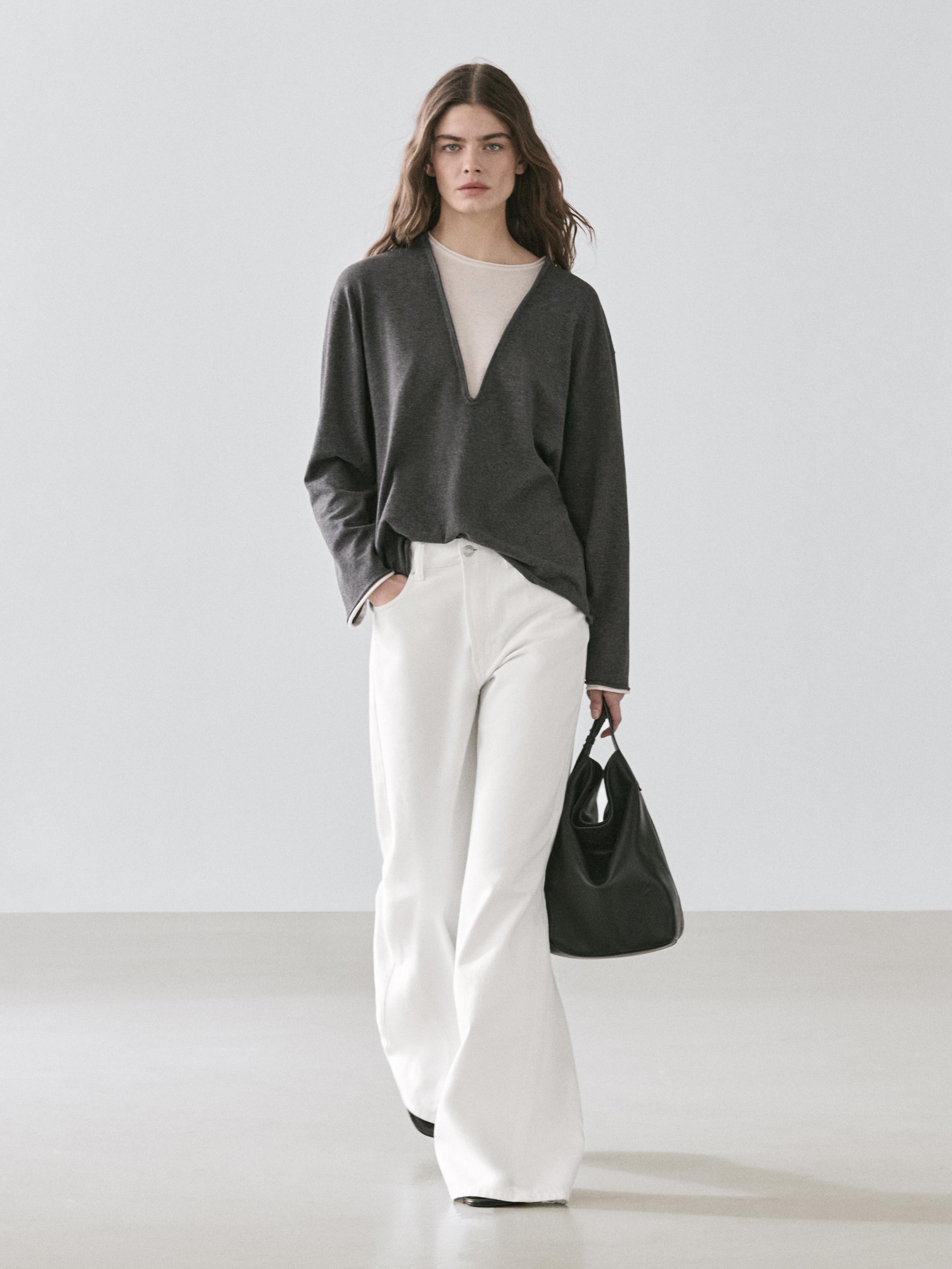 Cotton blend knit sweater with contrast fabric